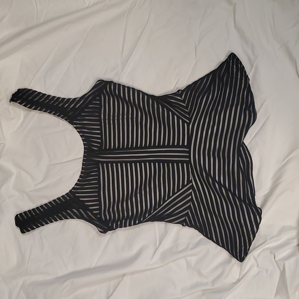 Bebe black peplum top size small